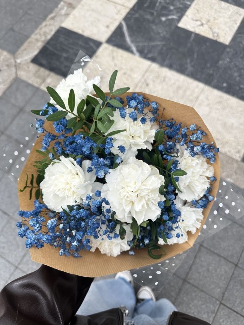 Blue Mist & White Carnation Bouquet — white carnations with blue gypsophila and olive branch in kraft wrap