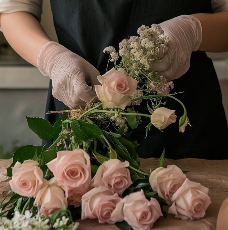 Florzo florist arranging a custom bouquet